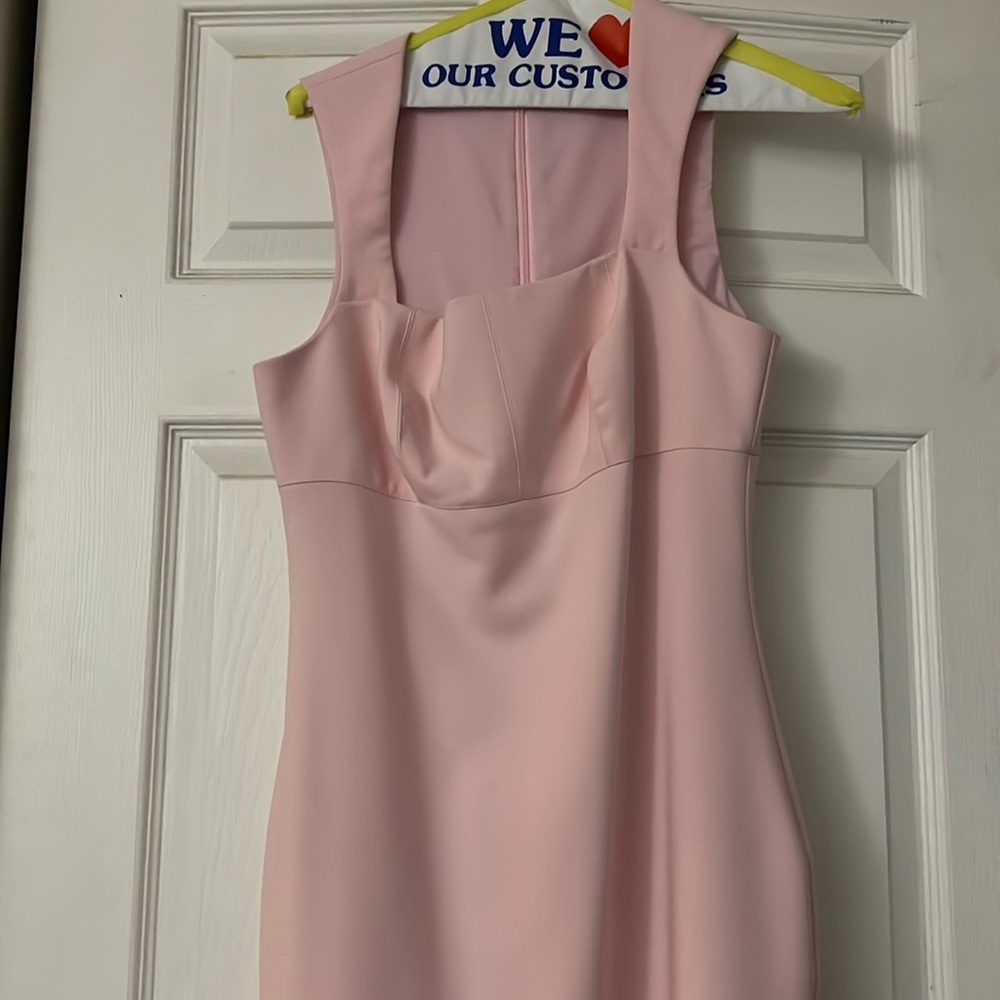 Likely size 6 midi dress. Without tags worn once. Professionally dry cleaned.